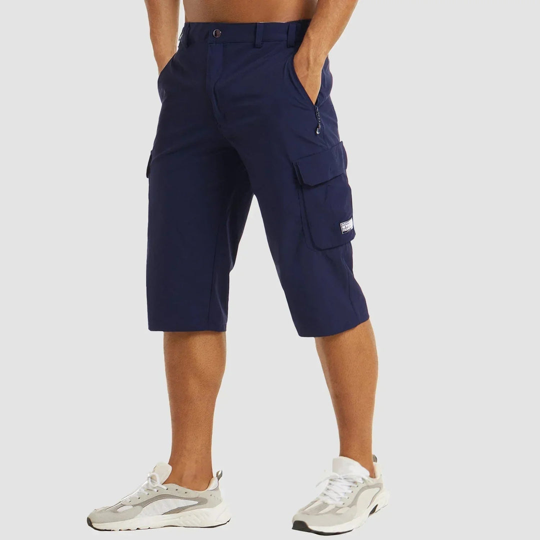 Men's versatile stretch cargo shorts. Ideal for casual outings, beach days, or active warm-weather adventures.