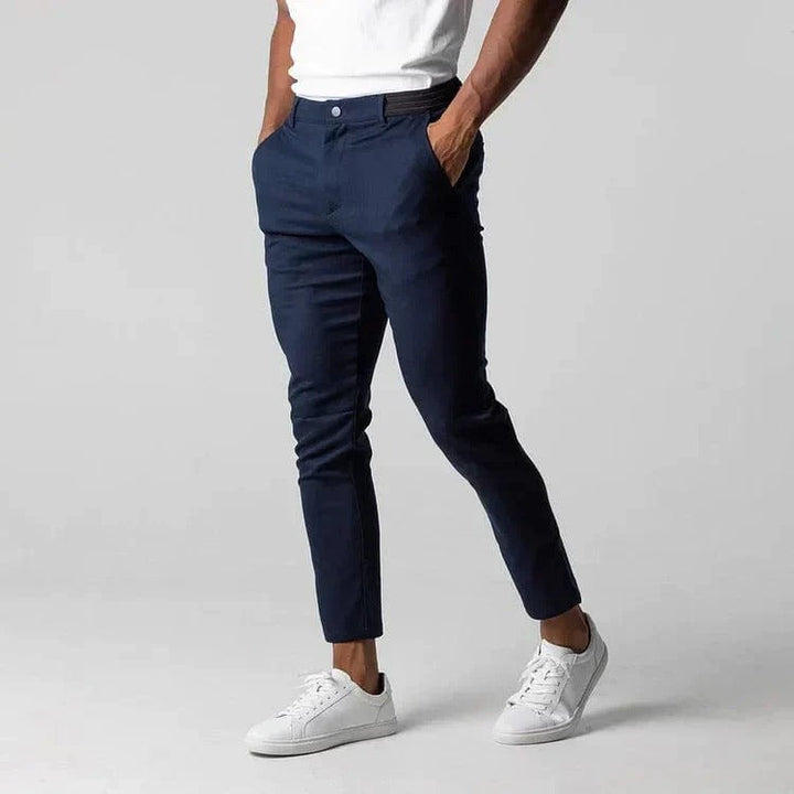 Men's stretch chino pants, tailored fit for comfortable everyday wear. Stylish and versatile cotton blend.