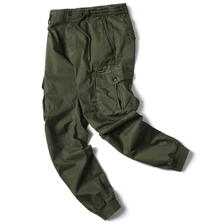 Active men's stretch cargo pants, utility pockets, durable for outdoor adventures & daily comfort.