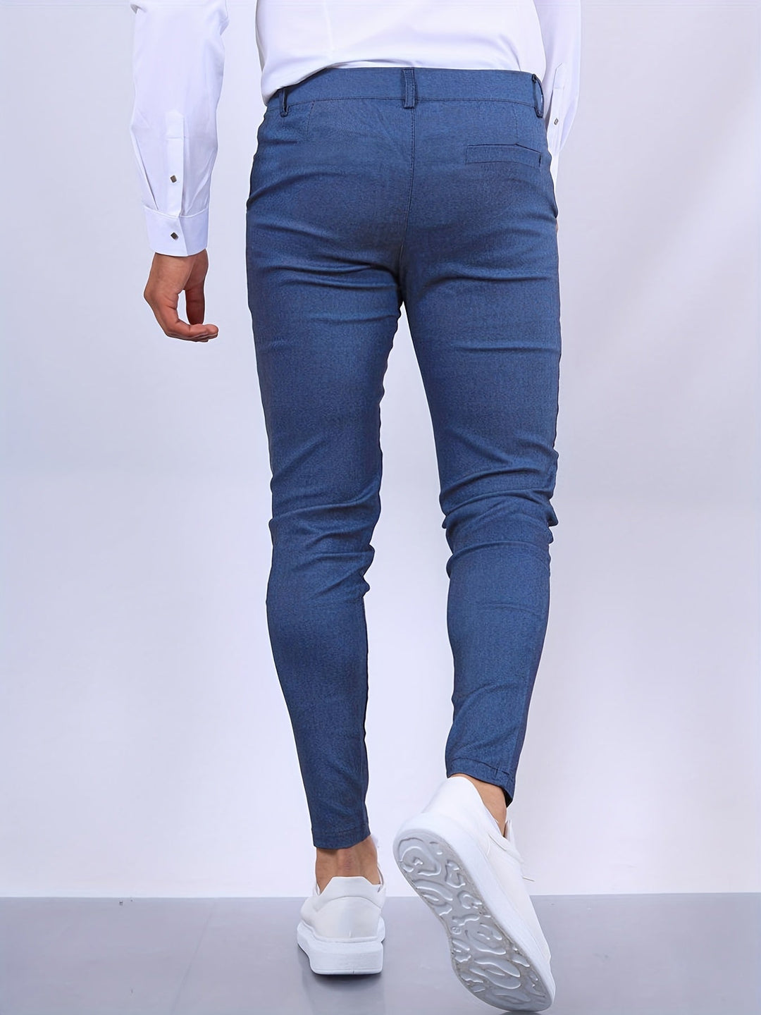 Everyday versatile men's skinny pants, offering a comfortable stretch fit and a sleek look for any modern wardrobe.