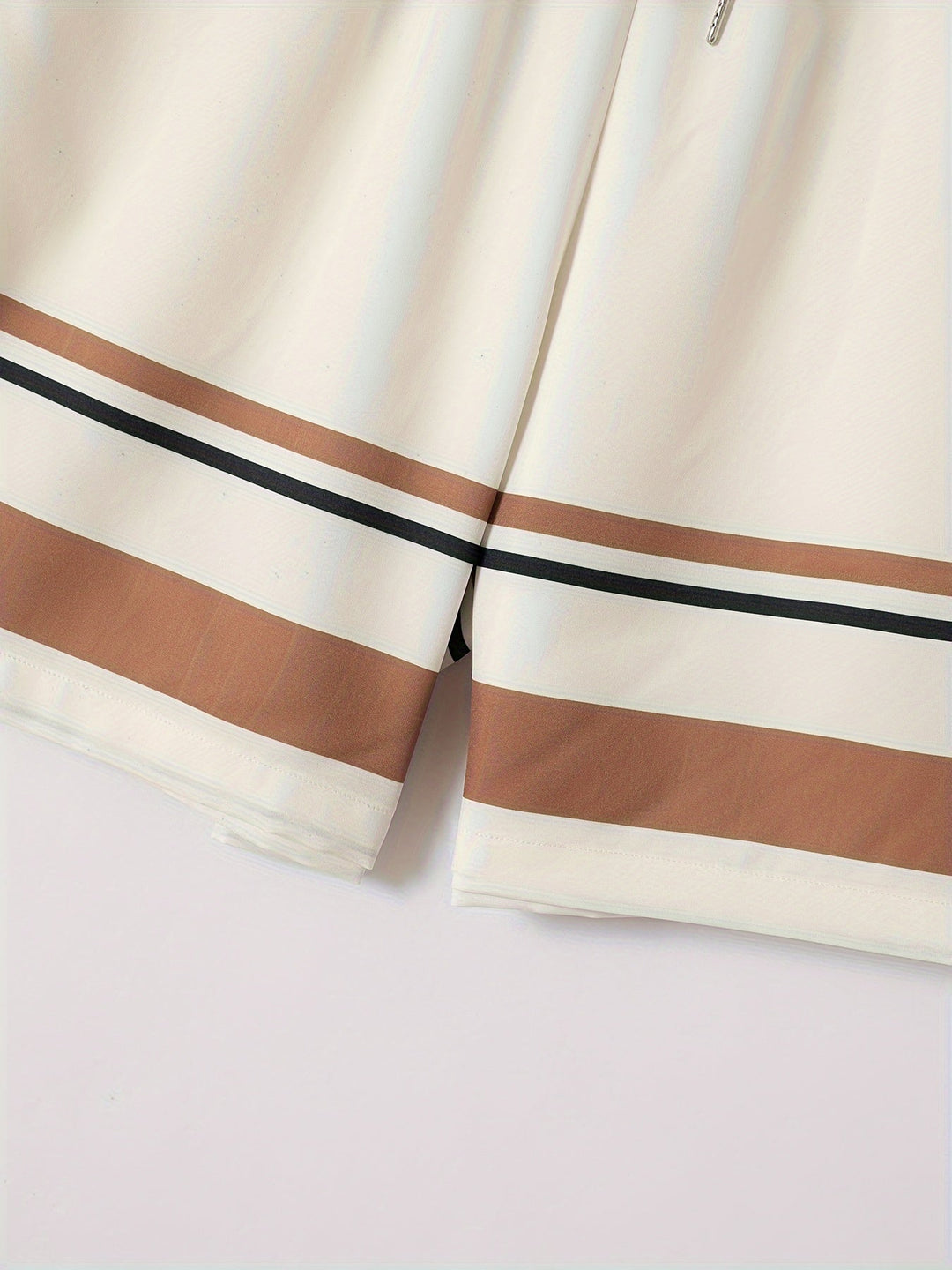 Stylish men's striped summer set. Relaxed fit shirt & elastic waist shorts for casual wear or beach days.