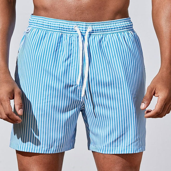 Stylish men's striped swim shorts with an adjustable drawstring, perfect for poolside comfort and casual summer wear.