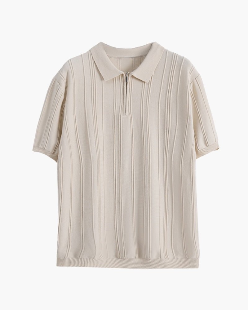 Man wearing a fashionable striped half-zip polo shirt, perfect for casual wear and men's summer fashion.