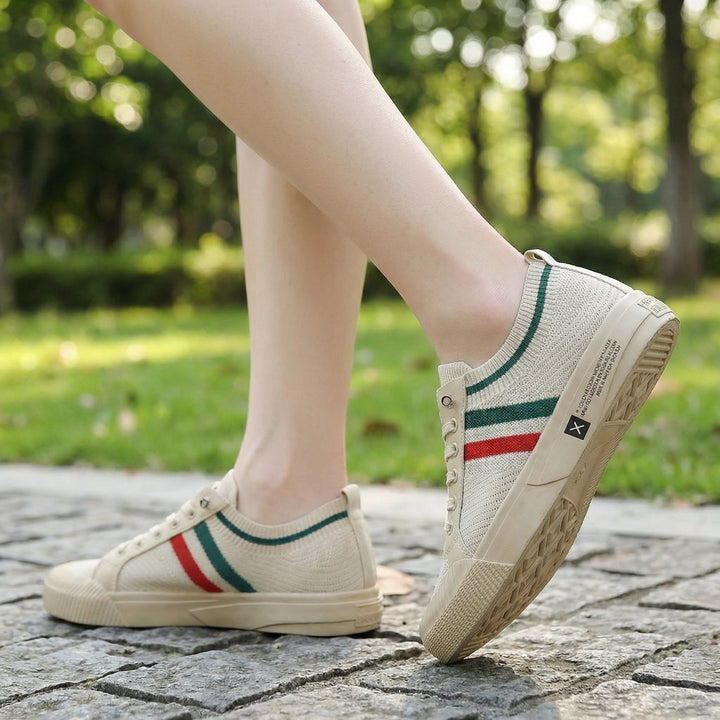 Low-profile men's striped sneakers. Lightweight, breathable casual shoes for everyday style and ultimate comfort.