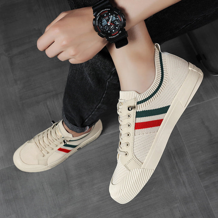 Breathable men's striped sneakers. Lightweight casual footwear, perfect for everyday fashion and comfort.