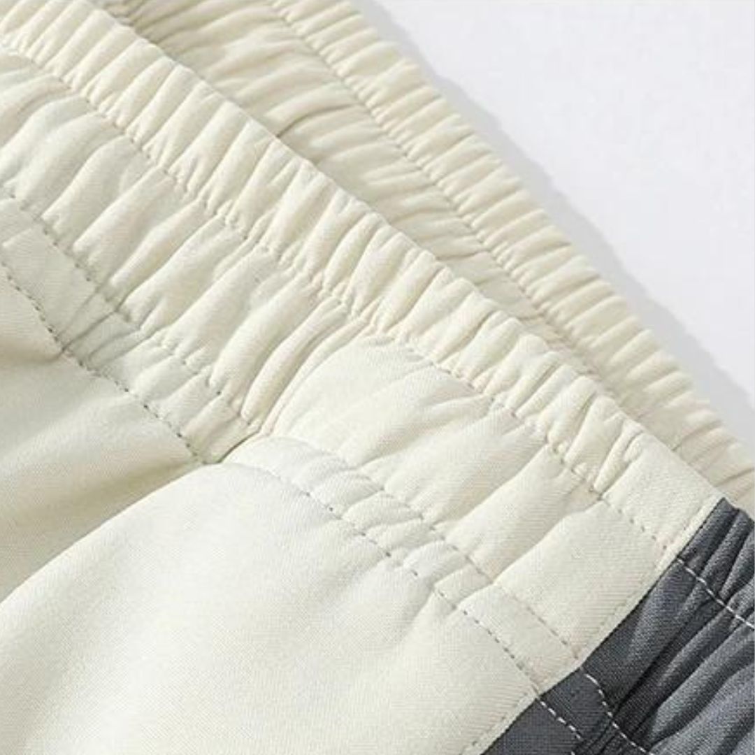 Men's striped jogging suit pants, comfortable activewear for casual wear & athletic activities.