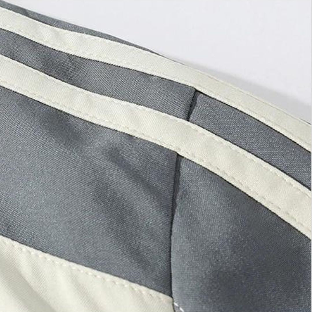 Men's striped sports tracksuit, durable athletic apparel for running, training, and active comfort.