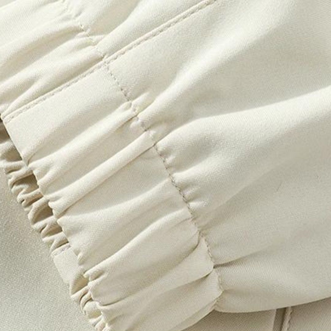 Close-up of striped fabric detail on men's comfortable sports tracksuit jacket or pants.