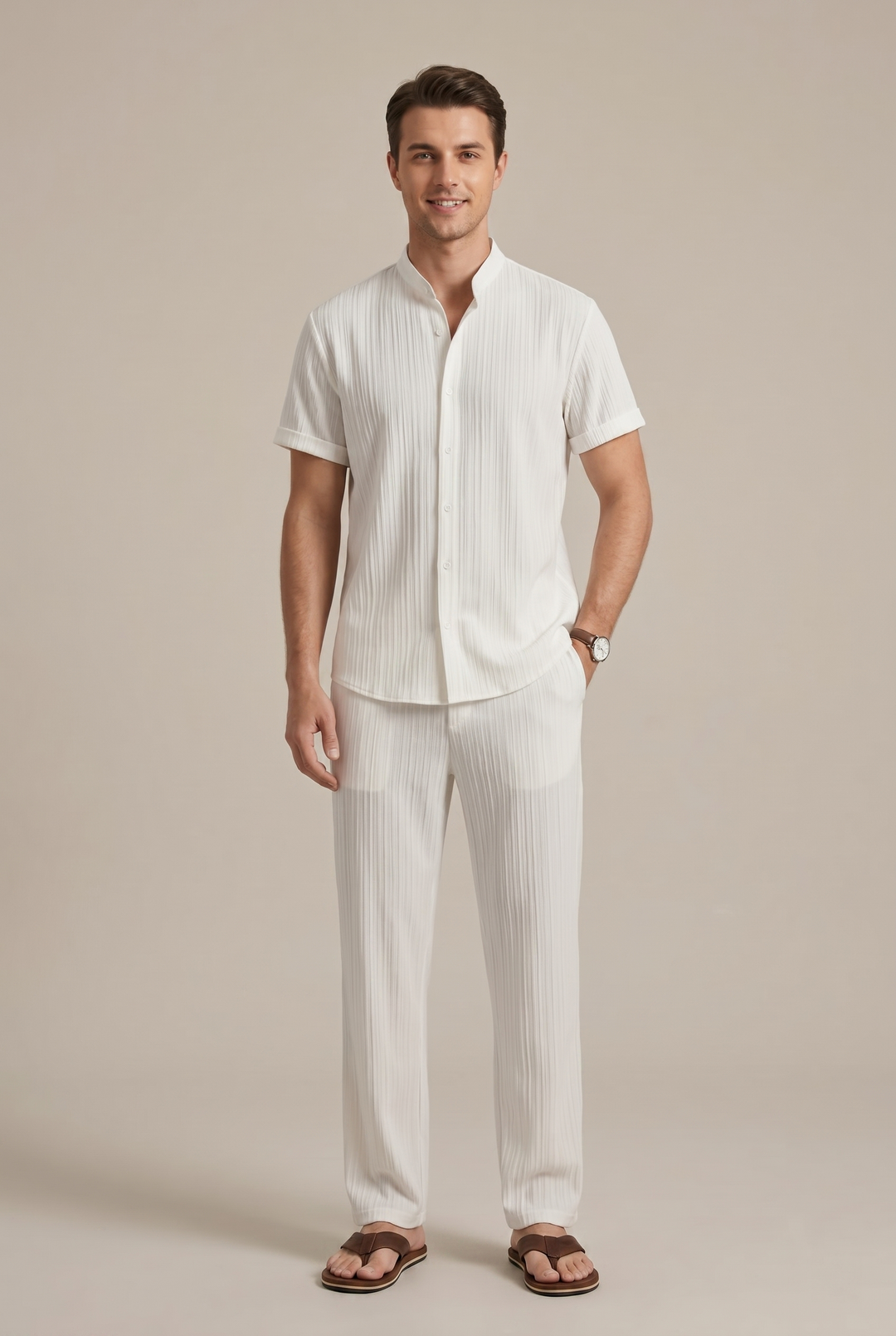 Full-body shot of a man wearing a chic striped two-piece co-ord set; relaxed fit shirt and trousers for men.