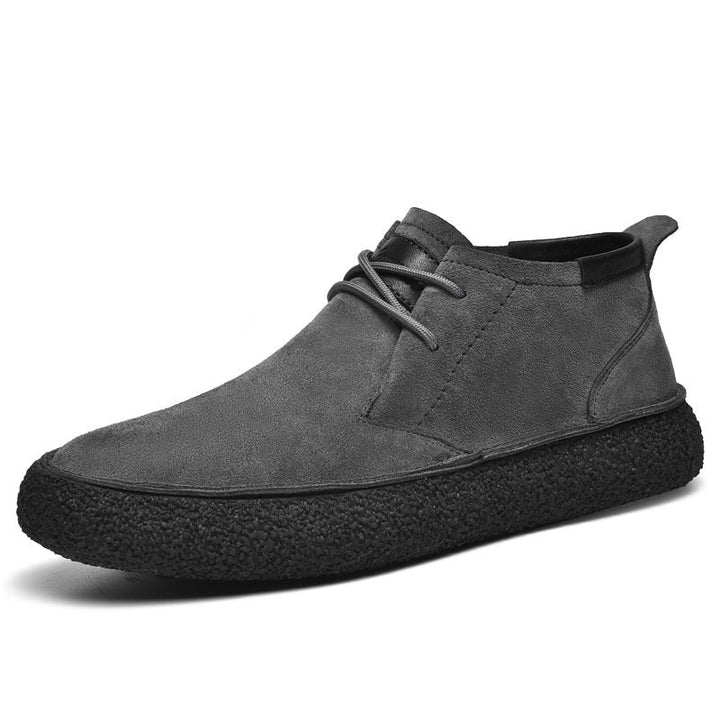 Smart casual men's mid-top shoes, structured and lace-up, perfect for urban everyday style.