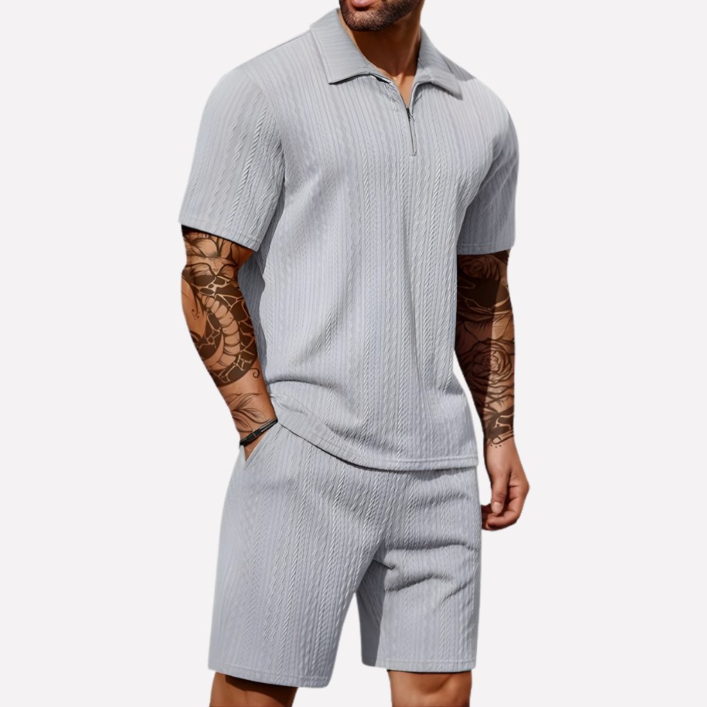 Men's complete casual look: stylish half-zip polo shirt & matching shorts set for summer fashion.