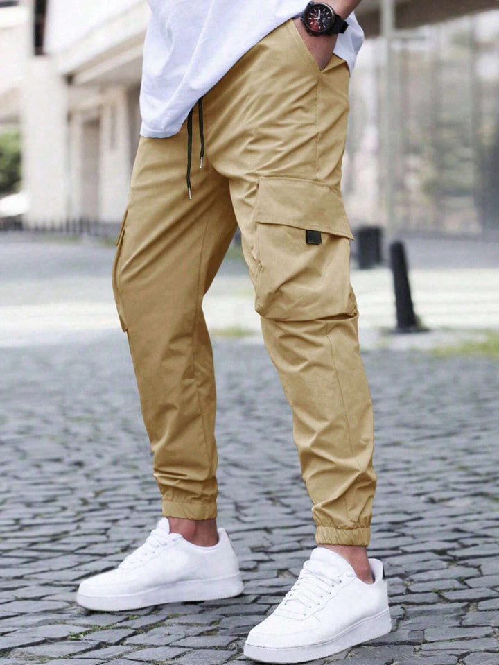 Stylish men's joggers with cargo pockets, black, perfect for a comfortable, casual, and relaxed outfit.