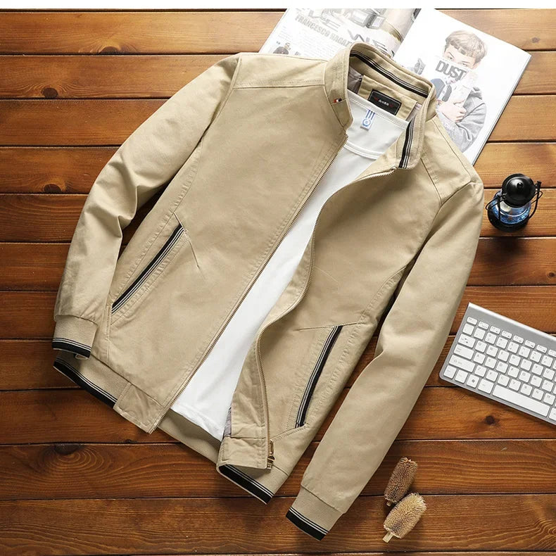 Close-up of men's casual bomber jacket showing durable fabric, sturdy front zipper, and ribbed collar detail.