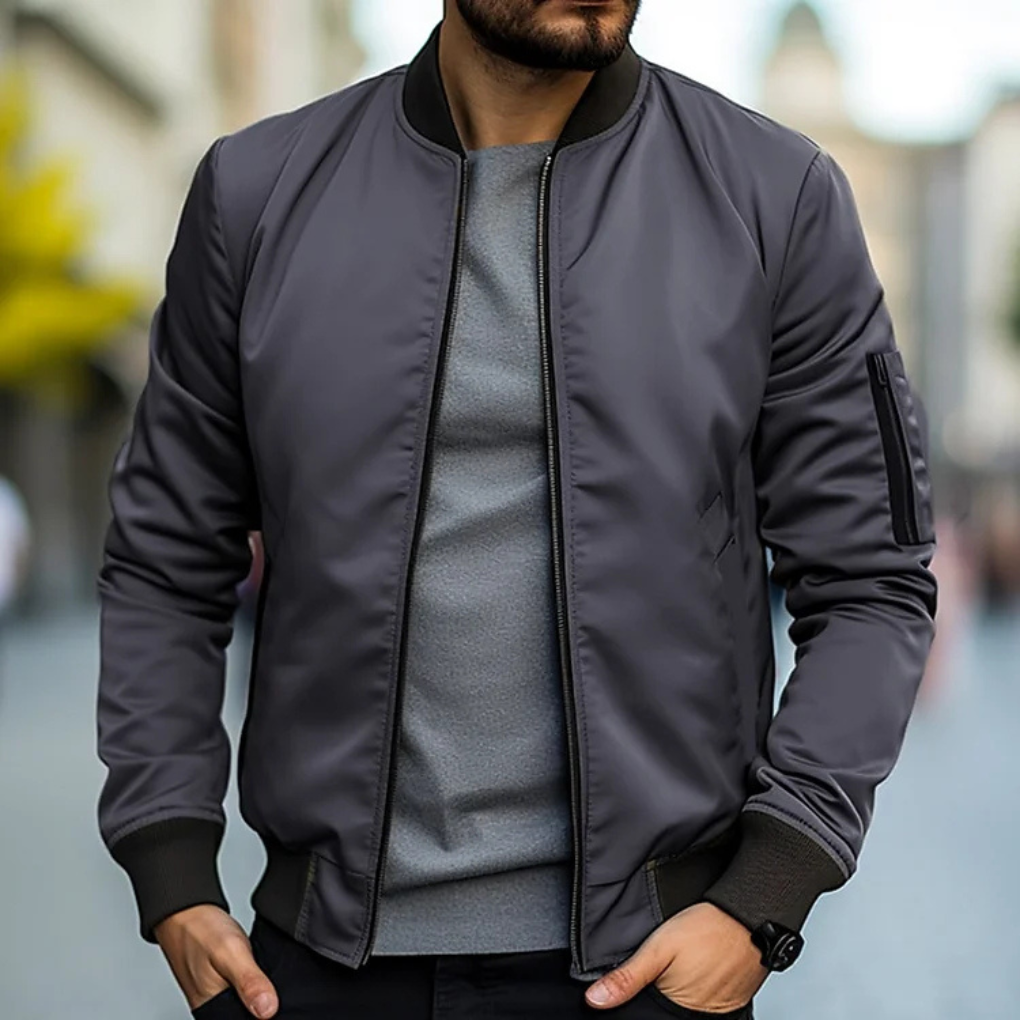 Slim fit men's bomber jacket with zip closure, ideal for street style and everyday outerwear.