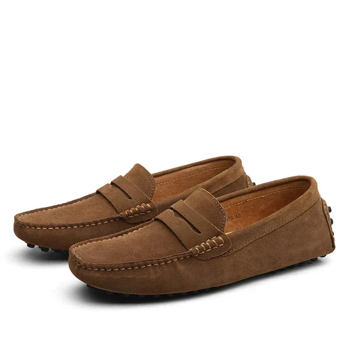 Men's stylish brown leather driving loafers. Comfortable slip-on casual shoes, versatile footwear for everyday style.