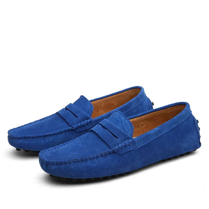Men's tan leather driving loafers. Classic slip-on shoes, comfortable and stylish for various occasions.