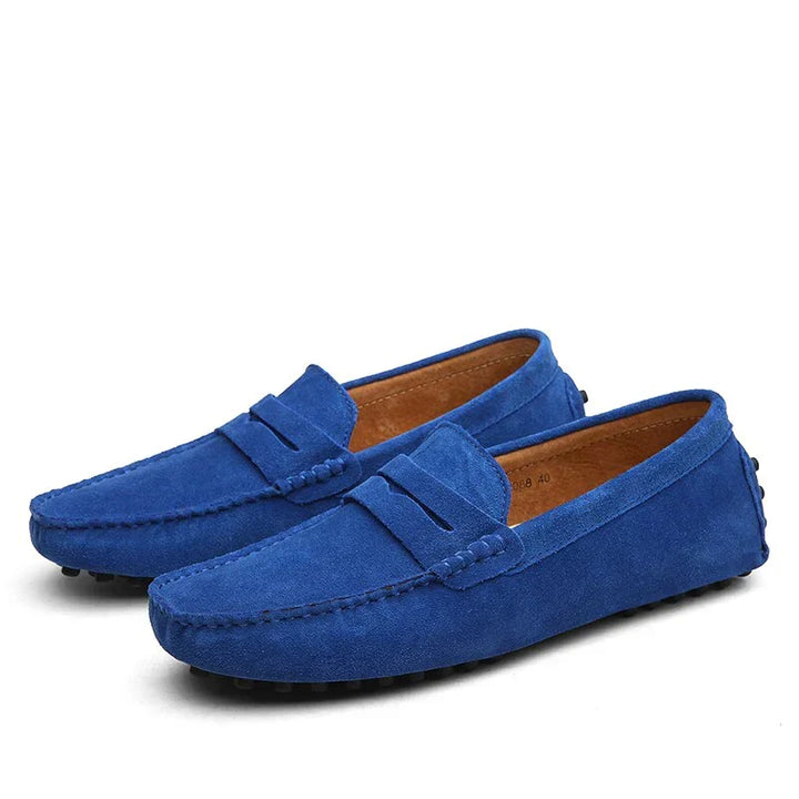 Men's tan leather driving loafers. Classic slip-on shoes, comfortable and stylish for various occasions.