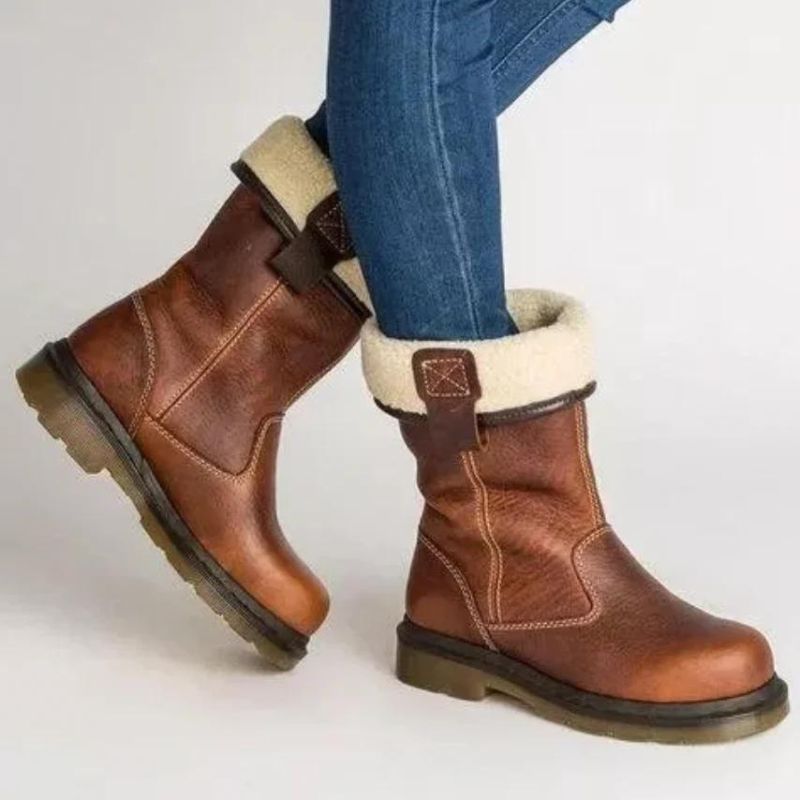 Men's stylish brown pull-on ankle boots with warm plush lining & lug sole for winter comfort.