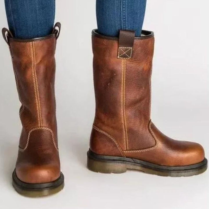 Brown men's pull-on ankle boots, warm & comfortable, featuring a durable lug sole for winter casual wear.