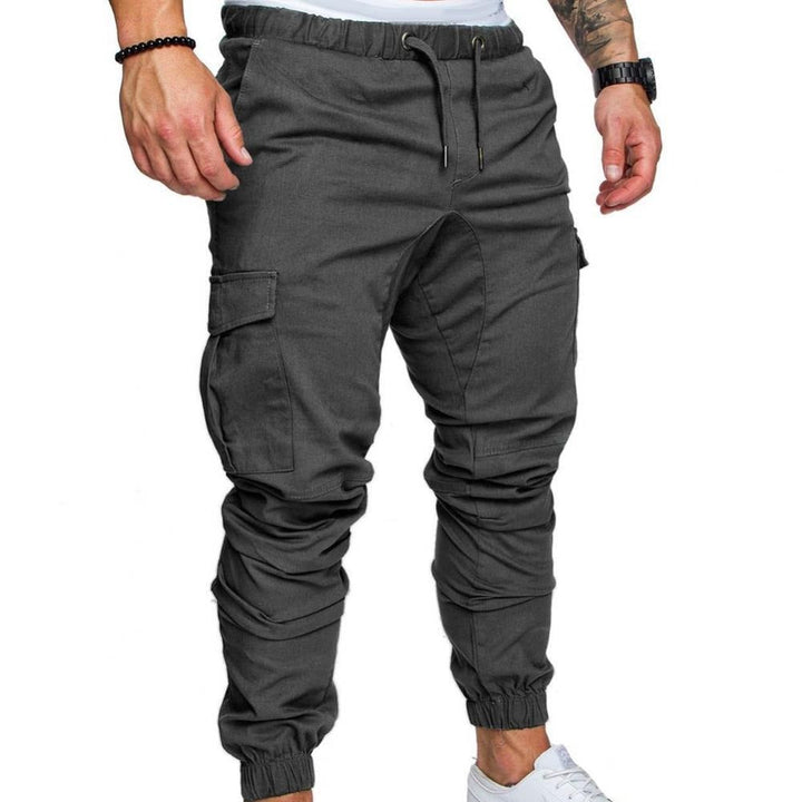 Versatile men's cargo pants, blending fashion with utility for casual outings & adventure gear.