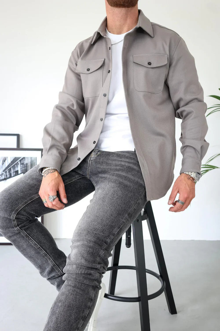 Versatile men's long sleeve button-down overshirt in a smart casual style, ideal for layering.