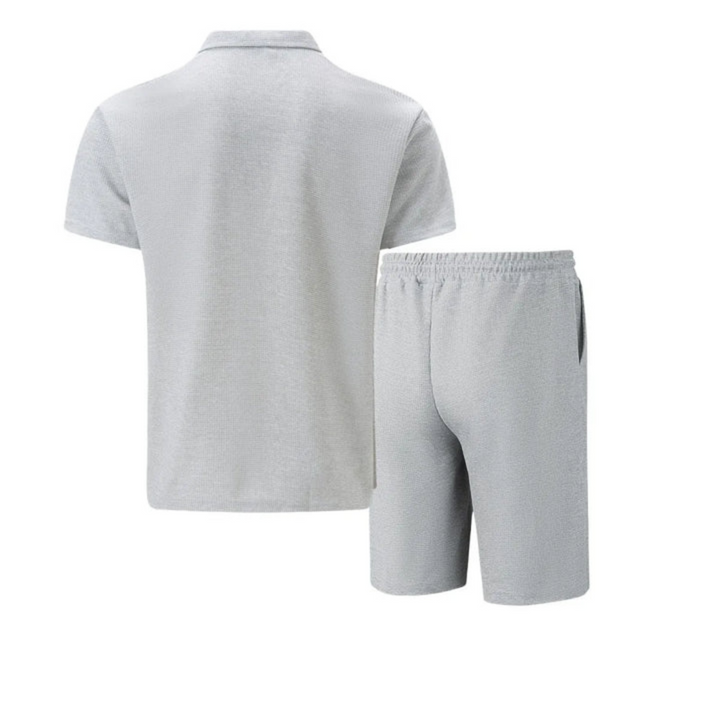 Men's stylish co-ord set: short-sleeve zip polo shirt & drawstring shorts. Perfect casual summer outfit.