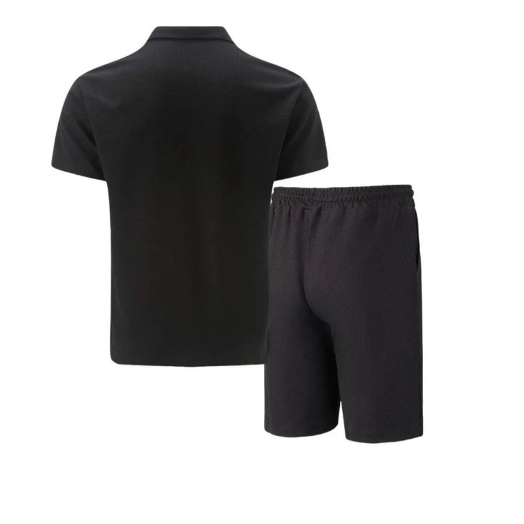 Close-up of a men's stylish zip polo shirt, part of a comfortable co-ord set with drawstring shorts.