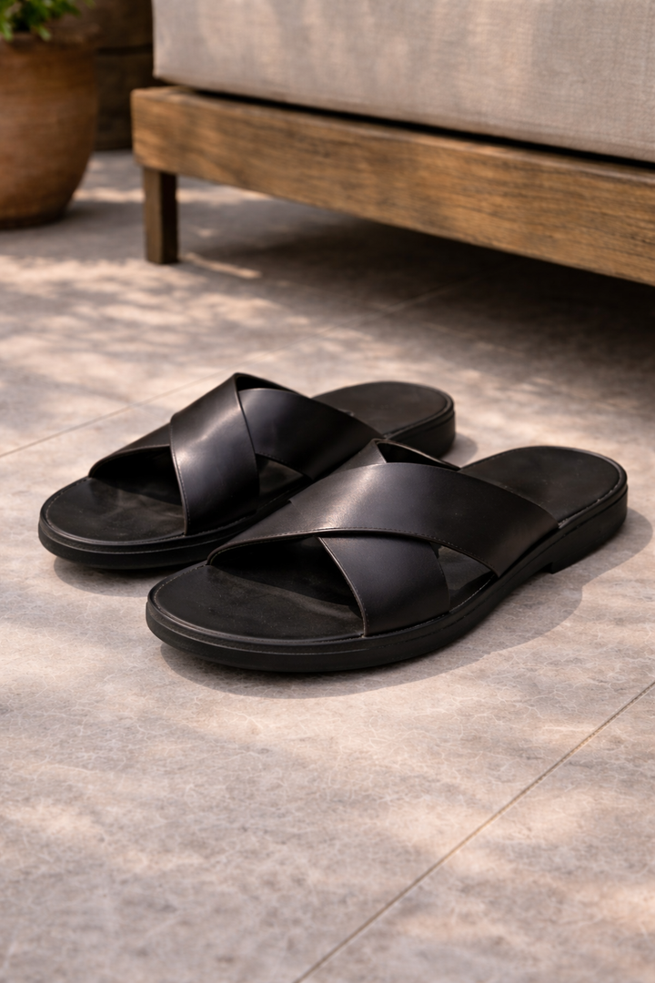 Versatile men's slide sandals with cross straps for casual summer wear. Comfortable slip-on warm weather footwear.