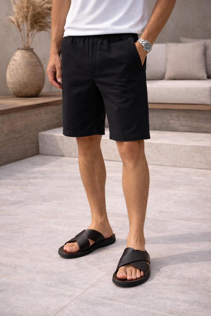 Stylish men's cross strap slide sandals, offering summer comfort. Casual slip-on footwear for versatile warm weather wear.