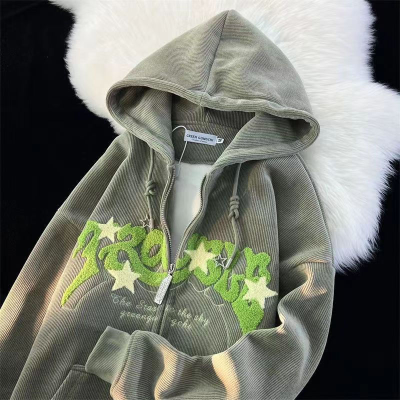 Close-up of a men's embroidered pullover hoodie, highlighting intricate detail and soft fabric.