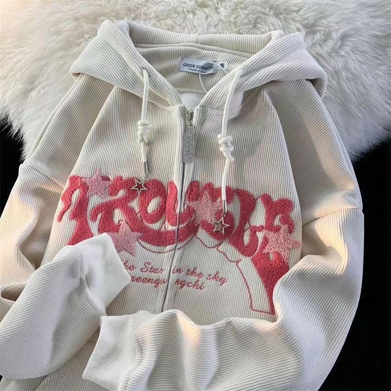 Men's embroidered streetwear hoodie styled for a modern urban look, emphasizing comfort & versatility.