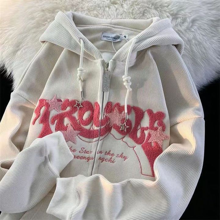 Men's embroidered streetwear hoodie styled for a modern urban look, emphasizing comfort & versatility.