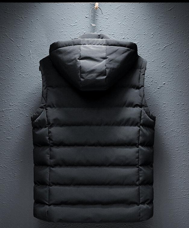 Warm men's Ethan quilted vest featuring a practical hood and multiple pockets for daily wear.