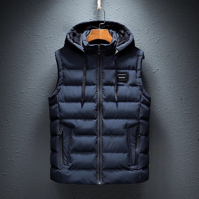 Modern men's Ethan quilted vest, featuring a comfortable hood and convenient pockets, great for layering.