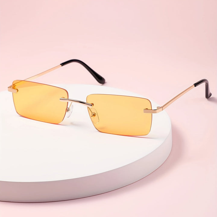 Stylish men's frameless sunglasses, lightweight & comfortable with UV protection & modern metal frame.