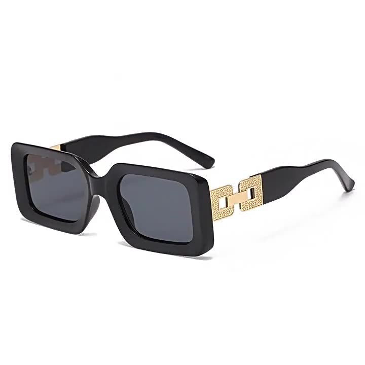 Fashionable men's gray square sunglasses, designed for style & comfort with UV protection. Eyewear accessory.