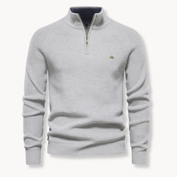 Men's half-zip ribbed long sleeve sweater. Stylish mock neck design, great for casual comfort & layering.