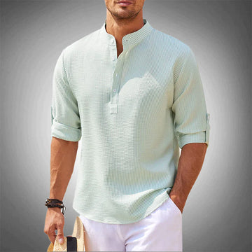 Modern gentleman's neutral long sleeve button-down shirt, stylish for both casual and semi-formal summer wear.