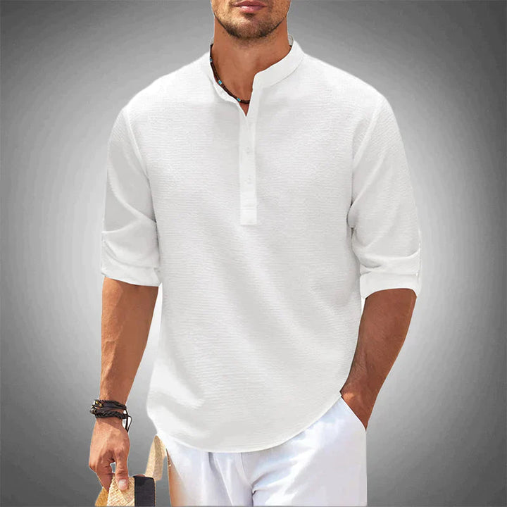 Stylish men's long sleeve button-down shirt, a modern wardrobe staple for versatile casual & semi-formal spring outfits.