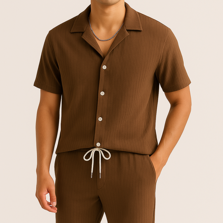 Trendy men's pleated two-piece summer set. Relaxed fit shirt and drawstring trousers for a stylish look.