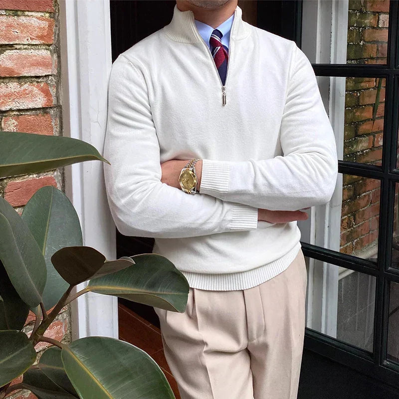Tailored fit men's quarter zip sweater with a sleek mock neck, offering a comfortable and stylish look for men.