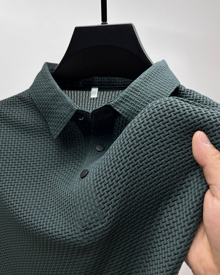 Short-sleeve men's polo, quick-dry performance fabric, athletic fit for active comfort.