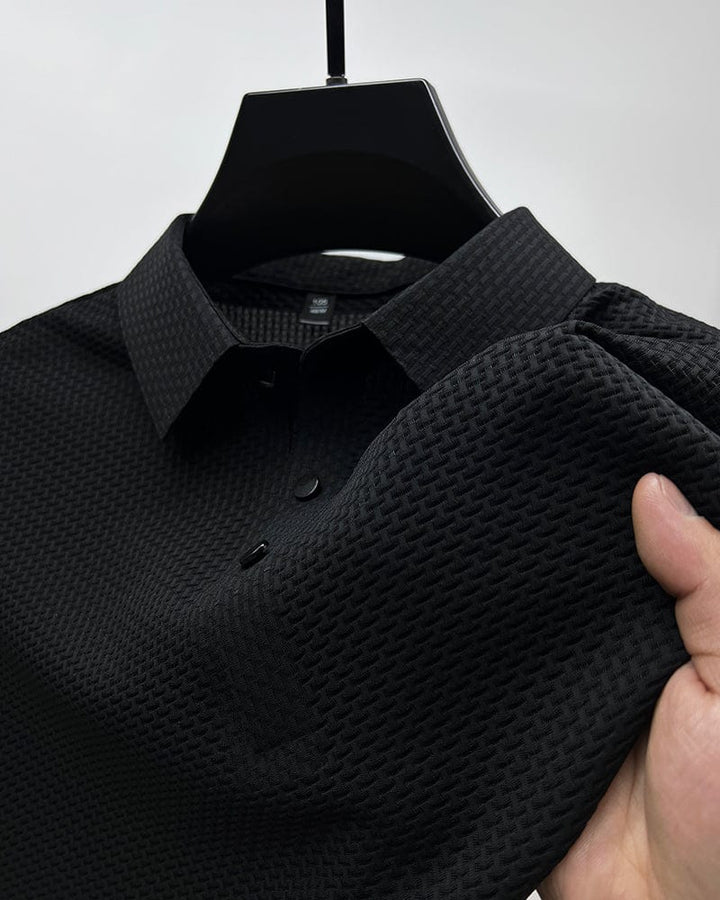 Stylish men's polo for business casual or weekend wear, offering comfort & performance.