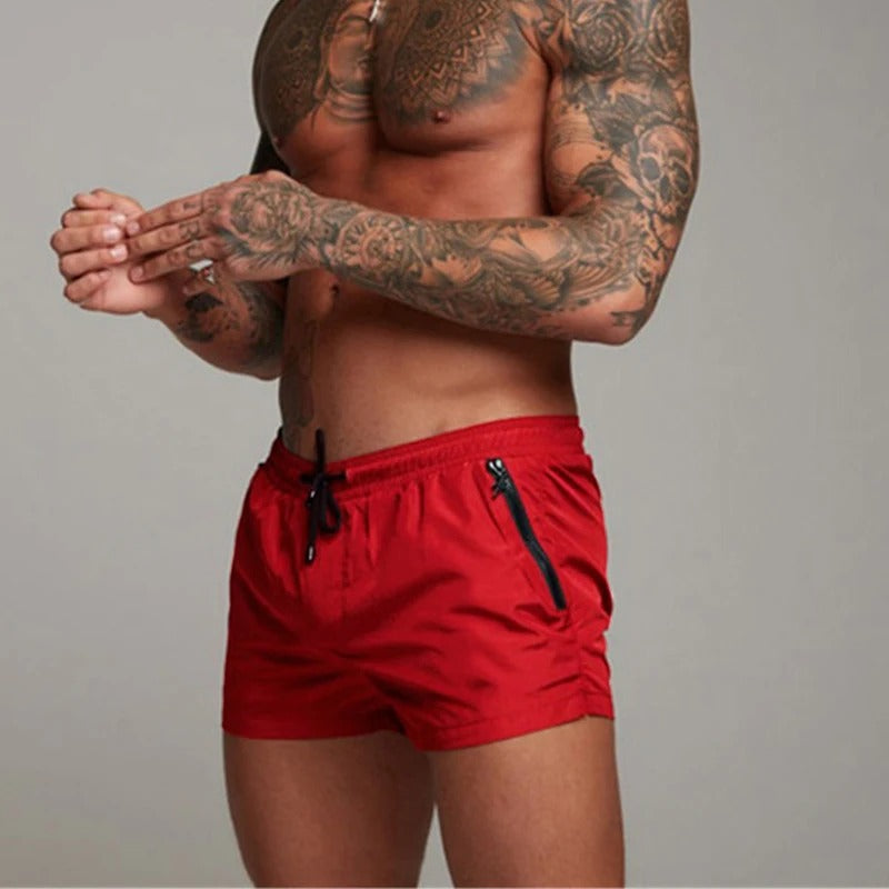 Stylish men's quick dry swim shorts, versatile for pool, beach, & active summer wear.