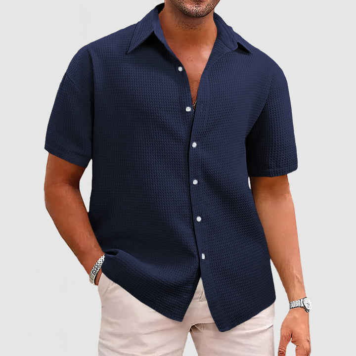Modern fit men's short sleeve shirt, stylish and comfortable for casual and smart occasions.