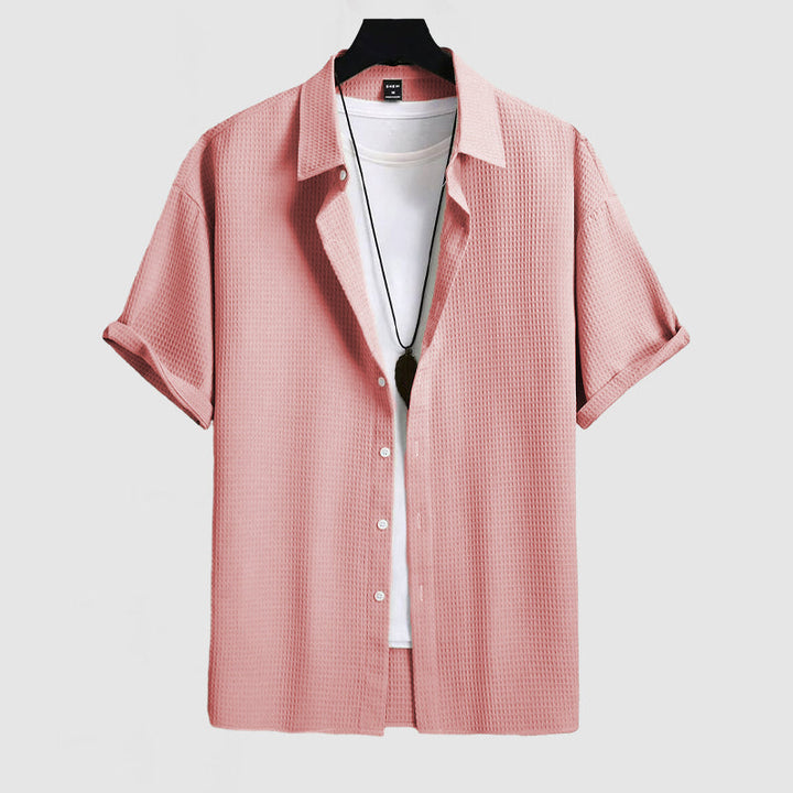 Breathable men's short sleeve shirt, perfect for comfortable summer wear & versatile styling.
