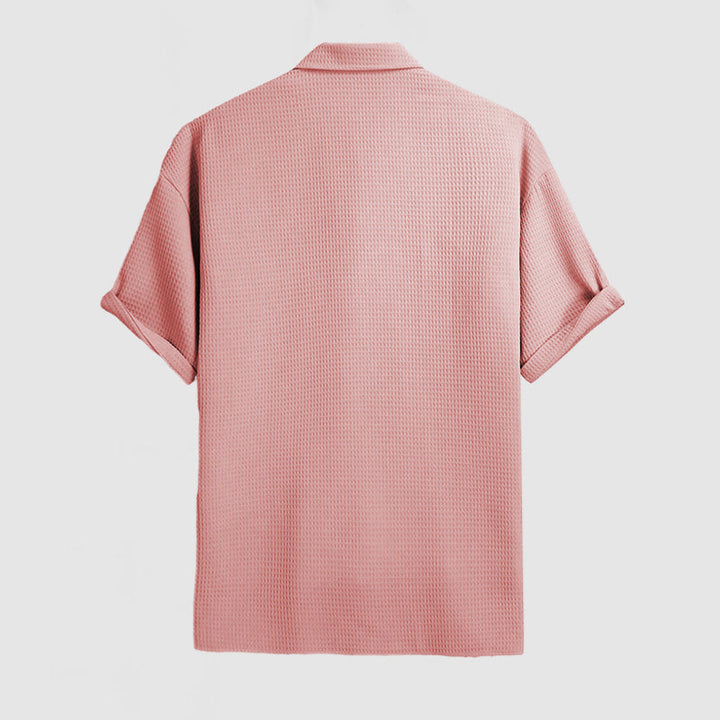 Classic men's button-down short sleeve shirt, versatile for casual to smart occasions.