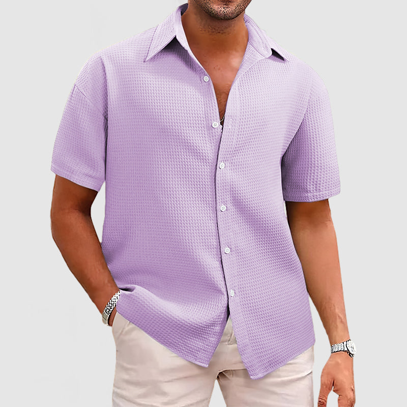 Elegant men's short sleeve button-down, great for business casual or stylish everyday wear.