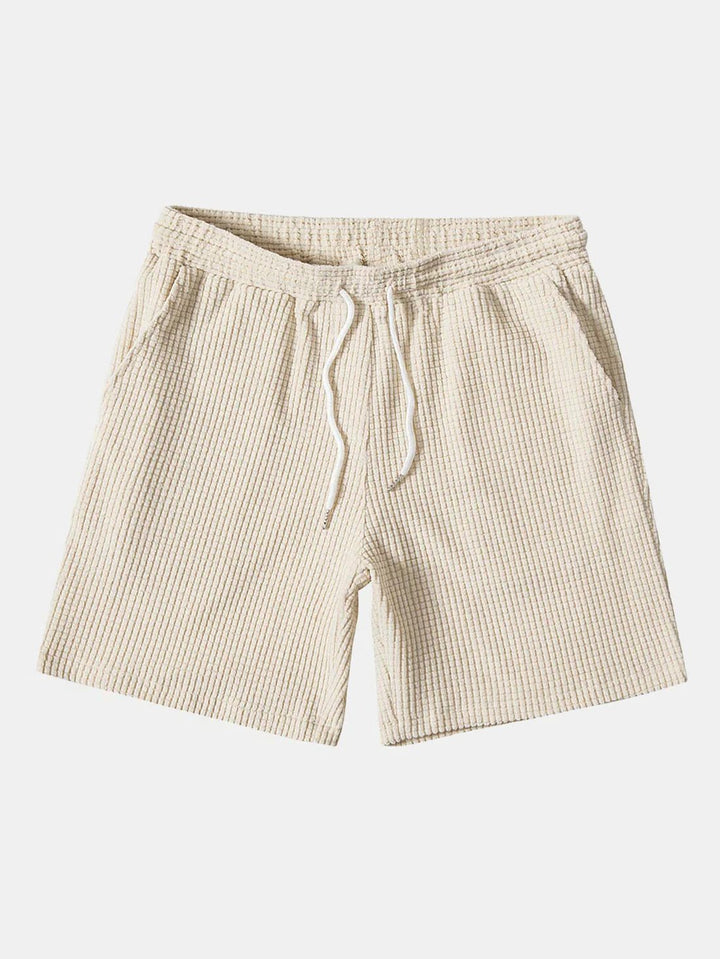 Fashionable men's short sleeve shirt and shorts set. A comfortable matching two-piece summer outfit.