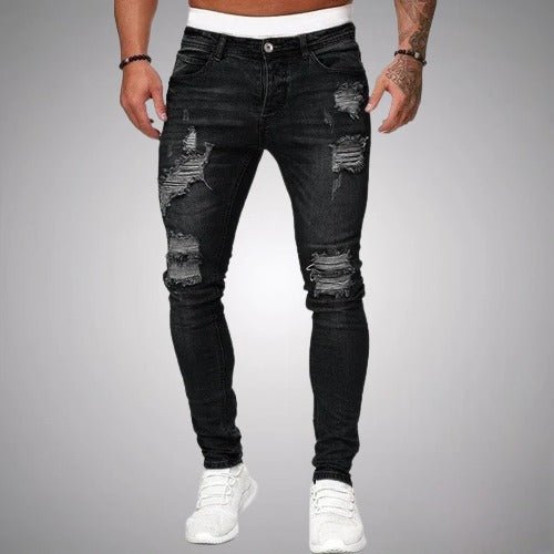 Men's stylish slim fit ripped jeans in a dark wash denim, perfect for casual everyday wear.
